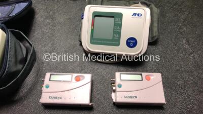 Job Lot Including 2 x Novacor Diasys Integra Blood Pressure Monitors, 2 x A&D Digital Blood Pressure Monitors (1 x Missing Battery Cover)2 x Omron Digital Blood Pressure Monitors (1 x Missing Battery Casing) 1 x Edan Pulse Oximeter in Case, 1 x Huntleigh - 7