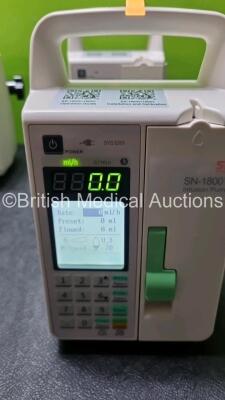 6 x Sino Medical SN-1800V Infusion Pumps (All Power Up) *SN 0496200513A03067 / 0496200525A05923 / 0496200513A028723 / 0496009513A03066 / 049600513A02871 / 04696200519A04679* - 2