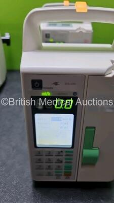 6 x Sino Medical SN-1800V Infusion Pumps (All Power Up) *SN 0496200513A03067 / 0496200525A05923 / 0496200513A028723 / 0496009513A03066 / 049600513A02871 / 04696200519A04679* - 3