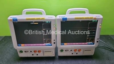 2 x Fukuda Denshi Dynascope DS-7200 Patient Monitors Including ECG, SpO2, NIBP, BP1, BP2, T1, T2 and Printer Options (Both Power Up, 1 x with Damage to Casing - See Photo) - 2