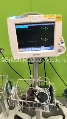 3 x Philips IntelliVue MP20 Patient Monitors on Stand with 3 x Philips M300A Multiparameter Modules with Press/Temp, NBP, SPO2 and ECG/Resp Options and Selection of Cables (All Power Up) *S/N DE72842765 / DE72842771 / DE72842801* - 3