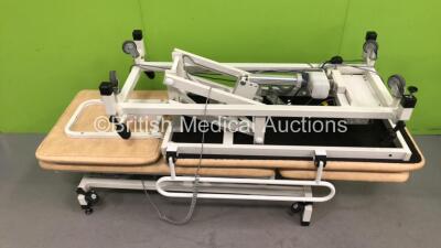 2 x Huntleigh Electric Patient Examination Couches with Controllers (Both Power Up) *S/N IPS-09681*