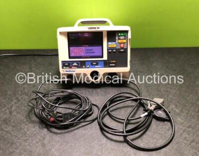 Medtronic Lifepak 20 Defibrillator / Monitor with ECG and Printer Options Including 1 x 3 Lead ECG Lead and 1 x Paddle Lead (Powers Up Damage to Casing - See Photos)