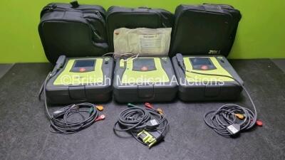 3 x Zoll AED PRO Defibrillators with 3 x Batteries, 3 x 3 Lead ECG Leads (All Power Up 1 x with Scratched Screen - See Photo) ) *SN AA11A019525 / AA13C027846 / AA07E006151*