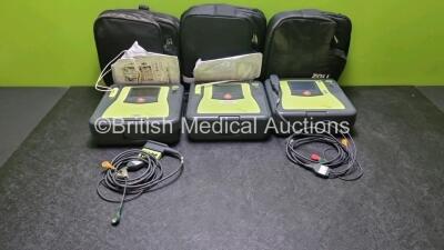 3 x Zoll AED PRO Defibrillators with 3 x Batteries, 2 x 3 Lead ECG Leads, 3 x Out of Date Electrode Pack (All Power Up) *SN AA05C000311 / AA13C027897 / AA13C027926*