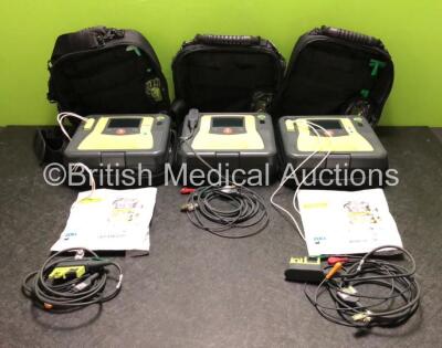 3 x Zoll AED PRO Defibrillators with 3 x Batteries, 3 x 3 Lead ECG Leads and 2 x Electrode Packs *Both Expired* (All Power Up, 2 x Good Batteries, 1 x Flat Battery) *SN AA09F013933 / AA10C016700 / AA10I018676*