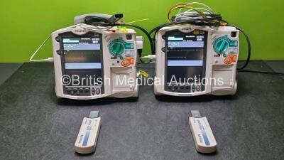 2 x Philips Heartstart MRx Defibrillator / Monitor Including , ECG, and Printer Options, with 2 x M3725A Test Load, 2 x Paddle Leads, 2 x Philips M3539A Module and 1 x Philips M1674A 3 Lead ECG Lead (Both Power Up) *SN US00601081 / US00592937*