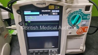 2 x Philips Heartstart MRx Defibrillator / Monitor Including , ECG, and Printer Options, with 2 x M3725A Test Load, 2 x Paddle Leads, 2 x Philips M3539A Module and 1 x Philips M1674A 3 Lead ECG Lead (Both Power Up) *SN US00601081 / US00592937* - 2