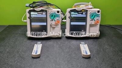 2 x Philips Heartstart MRx Defibrillator / Monitor Including , ECG, and Printer Options, with 2 x M3725A Test Load, 2 x Paddle Leads, 2 x Philips M3539A Module and 1 x Philips M1674A 3 Lead ECG Lead (Both Power Up) *SN US00686627 / US00576158*