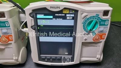 2 x Philips Heartstart MRx Defibrillator / Monitor Including , ECG, and Printer Options, with 2 x M3725A Test Load, 2 x Paddle Leads, 2 x Philips M3539A Module and 1 x Philips M1674A 3 Lead ECG Lead (Both Power Up) *SN US00686627 / US00576158* - 2