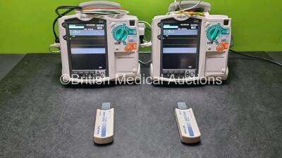 2 x Philips Heartstart MRx Defibrillator / Monitor Including , ECG, and Printer Options, with 2 x M3725A Test Load, 2 x Paddle Leads, 2 x Philips M3539A Module and 1 x Philips M1674A 3 Lead ECG Lead (Both Power Up) *SN US00581608 / US00581606*