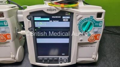 2 x Philips Heartstart MRx Defibrillator / Monitor Including , ECG, and Printer Options, with 2 x M3725A Test Load, 2 x Paddle Leads, 2 x Philips M3539A Module and 1 x Philips M1674A 3 Lead ECG Lead (Both Power Up) *SN US00581608 / US00581606* - 2