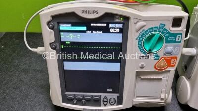 2 x Philips Heartstart MRx Defibrillator / Monitor Including , ECG, and Printer Options, with 2 x M3725A Test Load, 2 x Paddle Leads, 2 x Philips M3539A Module and 1 x Philips M1674A 3 Lead ECG Lead (Both Power Up) *SN US00586636 / US00599185* - 3