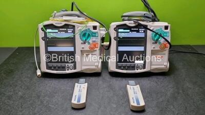 2 x Philips Heartstart MRx Defibrillator / Monitor Including , ECG, and Printer Options, with 2 x M3725A Test Load, 2 x Paddle Leads, 2 x Philips M3539A Module 1 x SpO2 Finger Sensor Connector and 1 x Philips M1674A 3 Lead ECG Lead (Both Power Up) *SN US0