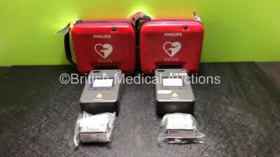 2 x Philips FR3 Heartstart Defibrillators in Carry Cases with 4 x Batteries (Both Power Up and Pass Self Test) *SN C16A-00896 / C12F-00432*