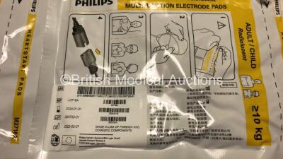 2 x Philips FR3 Heartstart Defibrillators in Carry Cases with 4 x Batteries and 4 x Electrode Packs *2 x Expire 2023, 2 x Expire 2024* (Both Power Up and Pass Self Test) *SN C17A-00150 / C13F-00924* - 5