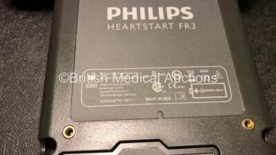 2 x Philips FR3 Heartstart Defibrillators in Carry Cases with 4 x Batteries and 4 x Electrode Packs *2 x Expire 2023, 2 x Expire 2024* (Both Power Up and Pass Self Test) *SN C17A-00150 / C13F-00924* - 10