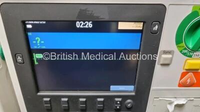 2 x Philips Heartstart XL+ Defibrillators Including PACER, ECG and Printer Options with 2 x Philips M1674A 3 Lead ECG LeadS, 2 x Philips Battery Ref 989803167281 and 2 x Paddle Lead (Both Power Up 1 x with Slight Crack in Casing - See Photo) *SN US4141219 - 2