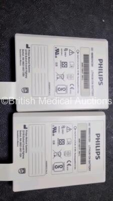 2 x Philips Heartstart XL+ Defibrillators Including PACER, ECG and Printer Options with 2 x Philips M1674A 3 Lead ECG LeadS, 2 x Philips Battery Ref 989803167281 and 2 x Paddle Lead (Both Power Up 1 x with Slight Crack in Casing - See Photo) *SN US4141219 - 8