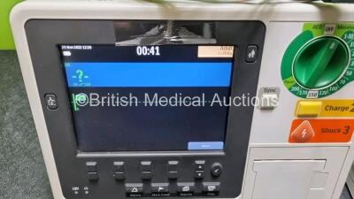 2 x Philips Heartstart XL+ Defibrillators Including PACER, ECG and Printer Options with 2 x Philips M1674A 3 Lead ECG Lead, 2 x Philips Battery Ref 989803167281 and 2 x Paddle Lead (Both Power Up) *SN US41412202 / US51413166* - 2