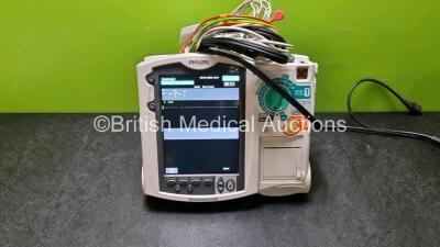 Philips Heartstart MRx Defibrillator / Monitor Including Pacer, ECG, SpO2, NIBP, CO2 and Printer Options with 1 x Philips M1674A 3 Lead ECG Lead 1 x Philips M359A Module, 1 x Philips M3538A Paddle Lead (Powers up) *SN US00591053*