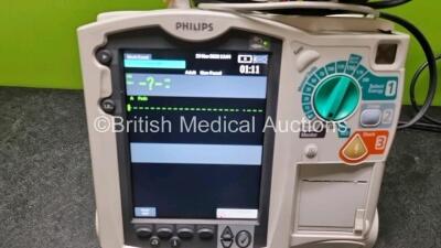 Philips Heartstart MRx Defibrillator / Monitor Including Pacer, ECG, SpO2, NIBP, CO2 and Printer Options with 1 x Philips M1674A 3 Lead ECG Lead 1 x Philips M359A Module, 1 x Philips M3538A Paddle Lead (Powers up) *SN US00591053* - 2