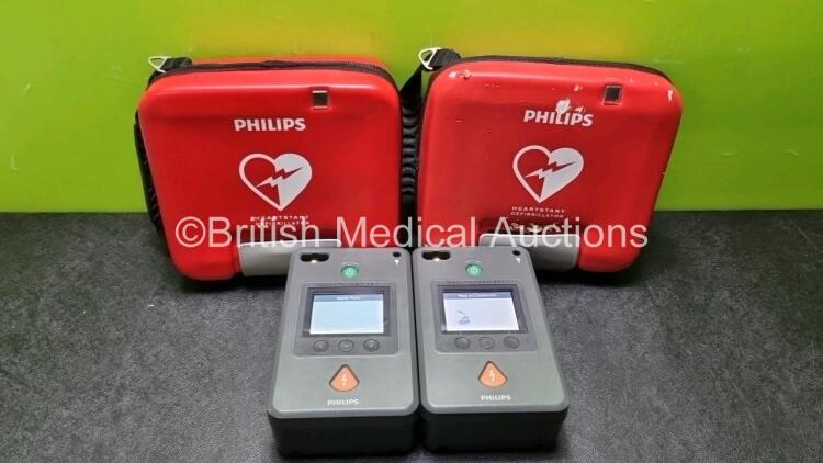 2 x Philips Heartstart FR3 Defibrillators In Carry Cases with 2 x Philips Heartstart Batteries Ref 989803150161 *Install Before C18G01206 / C14C00437* (Both Power Up) *SN 02-2028 / 05-2027*