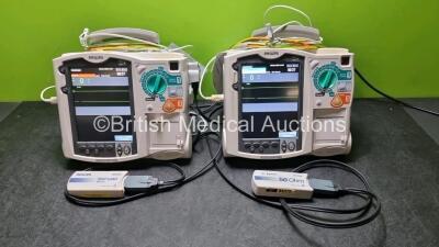 2 x Philips Heartstart MRx Defibrillator / Monitor Including , ECG, and Printer Options, with 2 x M3725A Test Loads, 2 x Paddle Leads, 2 x Philips M3539A Module and 2 x Philips M1674A 3 Lead ECG Lead (Both Power Up) *SN US00576156 / US00584967*