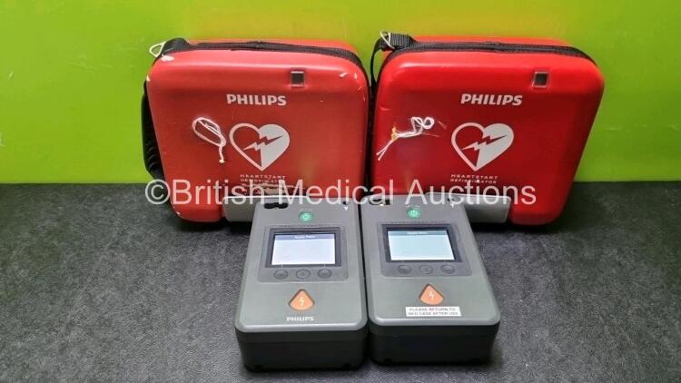 2 x Philips Heartstart FR3 Defibrillators In Carry Cases with 2 x Philips Heartstart Batteries Ref 989803150161 *Install Before 01-2027 / 02-2024* (Both Power Up) *SN C14C00398 / C18G01217*