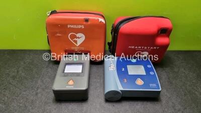 Job Lot Including 1 x Philips Heartstart FR3 Defibrillator In Carry Cases with 1 x Philips Heartstart Batteries Ref 989803150161 *Install Before 05-2027* and 1 x Philips Heartstart FR2+ Defibrillator with 1 x M386A Battery *Install Before 09-2023* SN C14