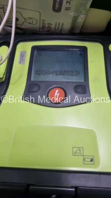 3 x Zoll AED PRO Defibrillators in Carry Cases with 3 x Batteries, 2 x 3 Lead ECG Leads, 3 x Electrode Packs *Out of Date* (All Power Up) *SN AA10B016244 / AA10C016900 / AA13B027593* - 4