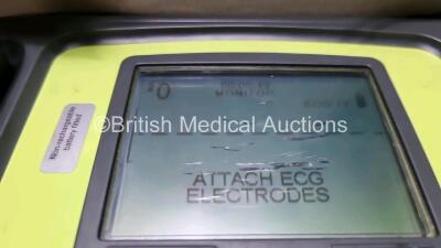 3 x Zoll AED PRO Defibrillators with 3 x Batteries, 3 x 3 Lead ECG Leads, 2 x Electrode Packs *Out of Date* (All Power Up 1 x with Scratching on Screen - See Photo) *SN AA10C016713 / AA10C016833 / AA08H11287* - 4