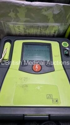 3 x Zoll AED PRO Defibrillators with 3 x Batteries, 3 x 3 Lead ECG Leads, 2 x Electrode Packs *Out of Date* (All Power Up 1 x with Scratching on Screen - See Photo) *SN AA10C016713 / AA10C016833 / AA08H11287* - 5