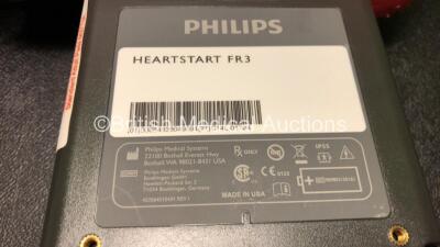 2 x Philips FR3 Heartstart Defibrillators in Carry Cases with 2 x Batteries and 2 x Electrode Packs *Both Expire 2023* (Both Power Up and Pass Self Test) *SN C18B-00275 / C14L-01724* - 8