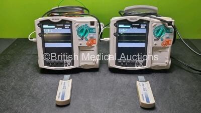 2 x Philips Heartstart MRx Defibrillator / Monitor Including , ECG, and Printer Options, with 2 x M3725A Test Load, 2 x Paddle Leads, 2 x Philips M3539A Module 1 x SpO2 Finger Sensor Connector and 1 x Philips M1674A 3 Lead ECG Lead (Both Power Up) *SN US0