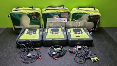 3 x Zoll AED PRO Defibrillators with 3 x Batteries, 3 x 3 Lead ECG Leads, 2 x Out Of Date Electrode Packs (All Power Up) *SN AA10B016512 / AA09L015651 / AA09C013161*