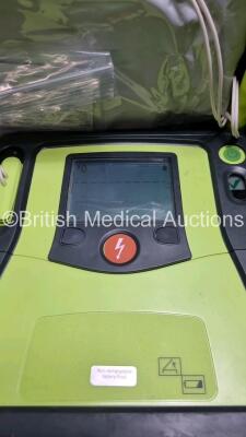 3 x Zoll AED PRO Defibrillators with 3 x Batteries, 1 x 3 Lead ECG Leads, 3 x Out of Date Electrode Packs (All Power Up Slight Scratches On Screen - See Photo) *SN AA10C016687 / AA110C016873 / AA06I003597* - 2