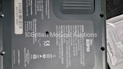 3 x Zoll AED PRO Defibrillators with 3 x Batteries, 1 x 3 Lead ECG Leads, 3 x Out of Date Electrode Packs (All Power Up Slight Scratches On Screen - See Photo) *SN AA10C016687 / AA110C016873 / AA06I003597* - 5