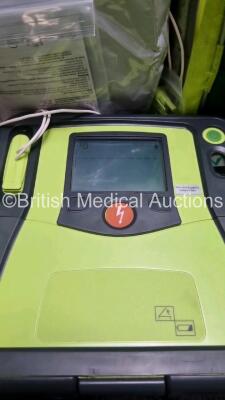 3 x Zoll AED PRO Defibrillators with 3 x Batteries, 3 x 3 Lead ECG Leads, 6 x Out of Date Electrode Packs (All Power Up) *SN AA09F0134926 / AA10C016644 / AA10C016871* - 4