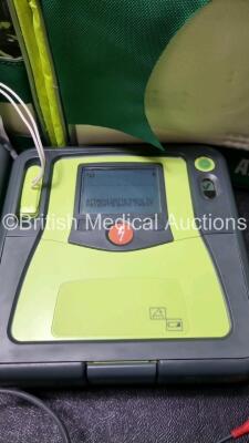 3 x Zoll AED PRO Defibrillators with 3 x Batteries, 2 x 3 Lead ECG Leads, 1 x Out of Date Electrode Pack (All Power Up) *SN AA07B005016 / AA10C016656 / AA09L015767* - 2