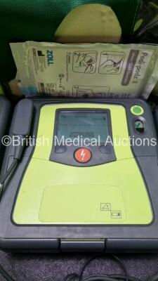 3 x Zoll AED PRO Defibrillators with 3 x Batteries, 2 x 3 Lead ECG Leads, 1 x Out of Date Electrode Pack (All Power Up) *SN AA07B005016 / AA10C016656 / AA09L015767* - 3