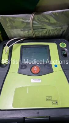 3 x Zoll AED PRO Defibrillators with 3 x Batteries, 3 x 3 Lead ECG Leads 4 x Electrode Packs *2 x In Date 2 x Out of Date* (All Power Up) *SN AA07E005943 / AA10C016844 / AA10C016788* - 2