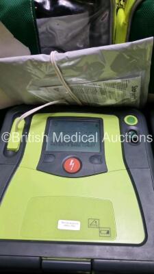 3 x Zoll AED PRO Defibrillators with 3 x Batteries, 3 x 3 Lead ECG Leads 4 x Electrode Packs *2 x In Date 2 x Out of Date* (All Power Up) *SN AA07E005943 / AA10C016844 / AA10C016788* - 4