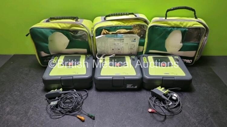 3 x Zoll AED PRO Defibrillators with 3 x Batteries, 2 x 3 Lead ECG Leads, 2 x Out of Date Electrode Packs (All Power Up) *SN AA13C027847 / AA06E002541 / AA06D002441*