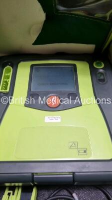 3 x Zoll AED PRO Defibrillators with 3 x Batteries, 2 x 3 Lead ECG Leads, 2 x Out of Date Electrode Packs (All Power Up) *SN AA13C027847 / AA06E002541 / AA06D002441* - 4