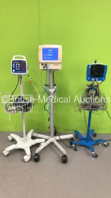 1 x CSI ComfortCuff 506N3 Series Monitor on Stand, 1 x GE Carescape V100 Dinamap Monitor on Stand and Fukuda Denshi DS-7100 Dynascope Monitor on Stand (All Power Up)