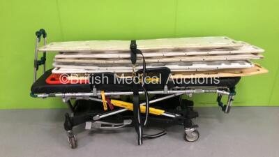 1 x Ferno Pegasus Hydraulic Ambulance Stretcher with 7 x Spinal Boards (Hydraulics Tested Working)