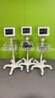 3 x Philips SureSigns VS3 Monitors on Stands (All Power Up) *US12639805 / US12639804 / CN12643498*