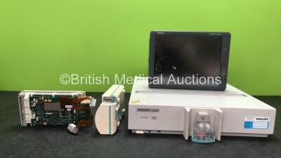 Mixed Lot Including 1 x Philips M1026B Gas Module (Powers Up) 1 x Schiller Cardiovit MS-2010 Monitor (Untested with Damaged Screen-See Photo) 1 x Philips M3001A Module Including ECG, NIBP, SpO2, and Temp Options (Missing Cover-See Photo) 1 x Unknown Model