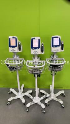 3 x Welch Allyn SPOT LXi Vital Signs Monitors with Ear Thermometers, Power Supplies and SpO2 Leads/Sensors on Stands (All Power Up) *NA* (S)